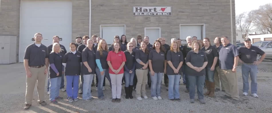 The Hart Electric team outside the building
