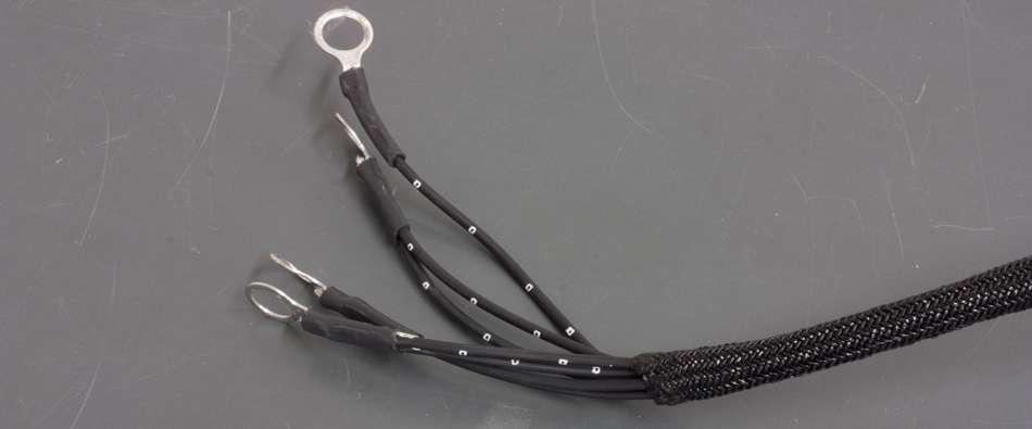 Braided wire harness with ring terminals