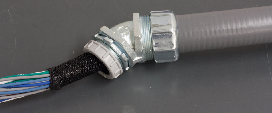 Wire bundle entering a flexible conduit fitting
